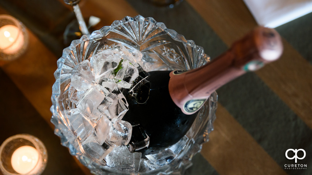 Champagne bottle on ice.