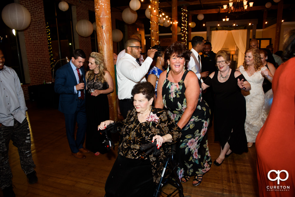 Wedding guests dance to the sounds of DJ Chris Scott.