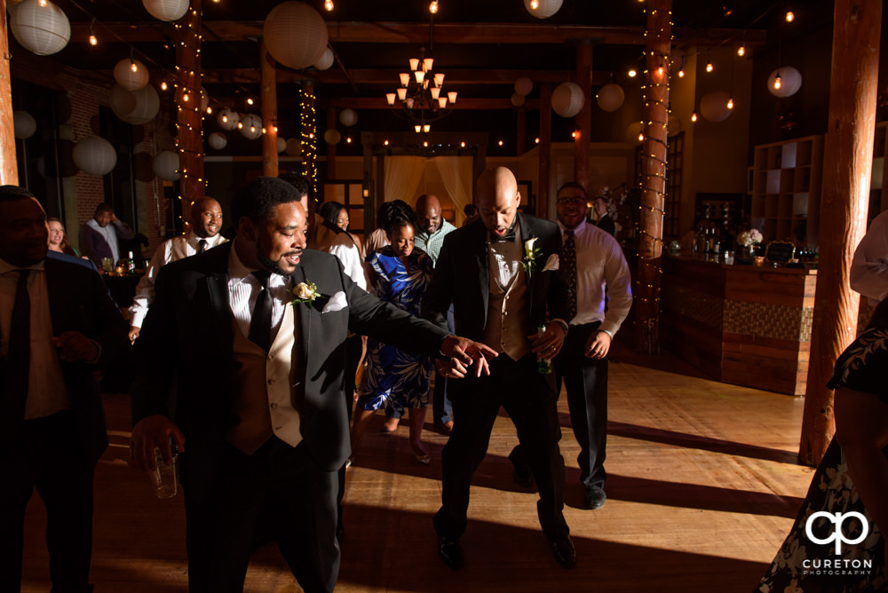 Wedding guests dance to the sounds of DJ Chris Scott.