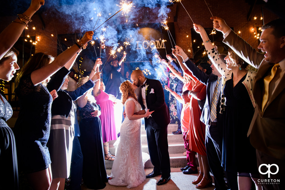 Sparkler exit at the wedding reception at The Loom in Simpsonville.
