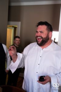Groom excited at a gift.