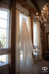 Bride's dress in window.