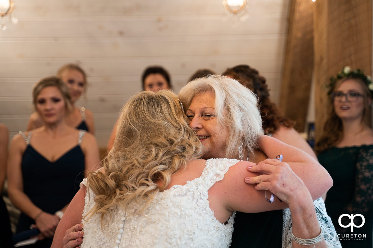 Bride hugging her grandma.