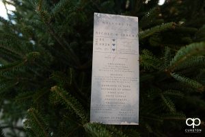 Wedding program in a Christmas tree.