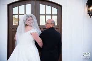 Bride and her father outside her venue.