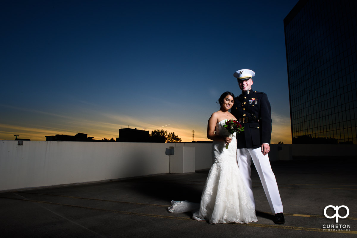 Bride and groom at sunset after their wedding ceremony at The Commerce Club in Greenville,SC.