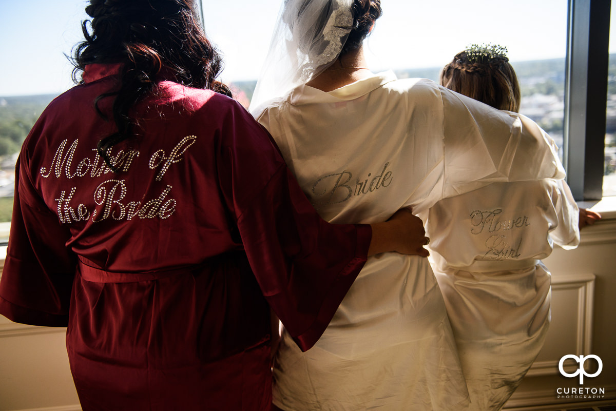 Bride and mother in robes.