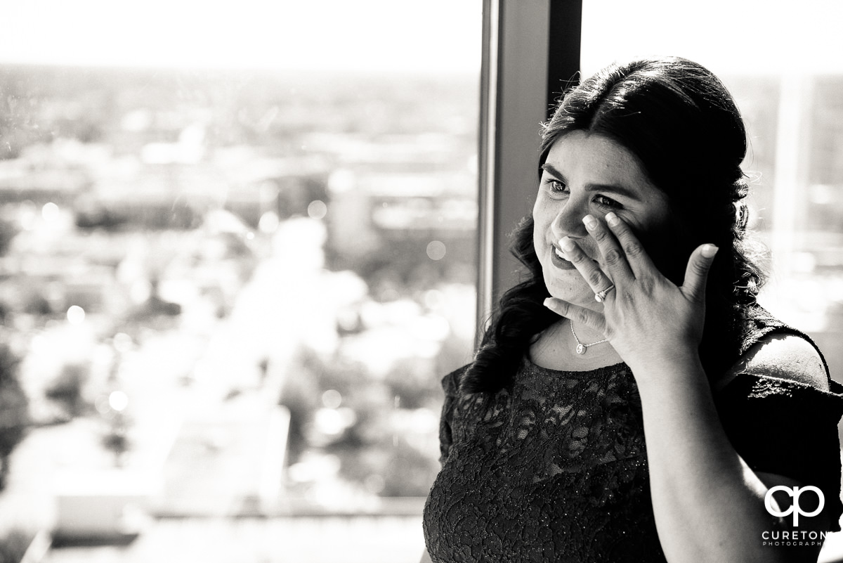 Bride's mother crying.