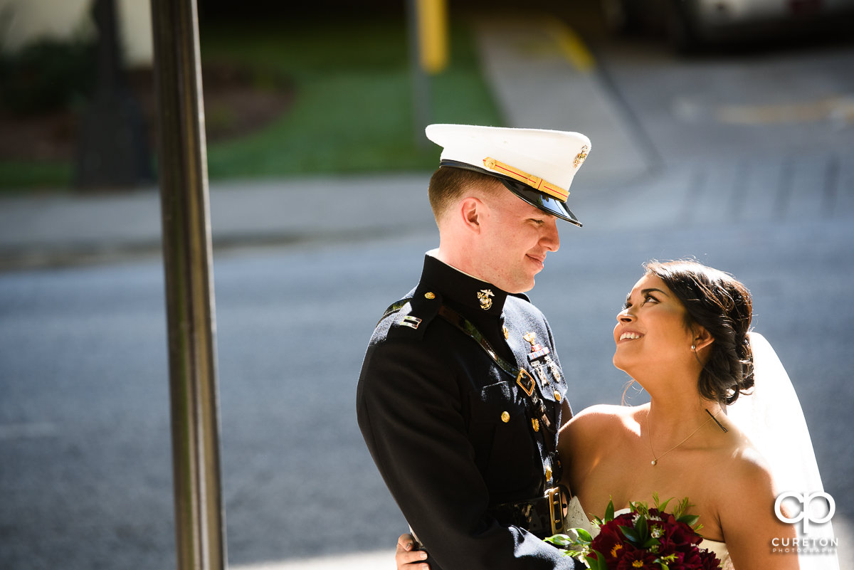 Bride and Groom looking at each other.