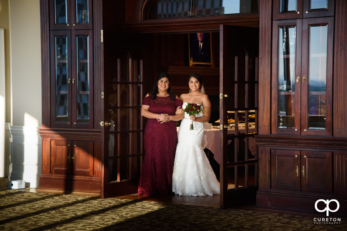 Bride preparing to walk down the aisle at the Commerce Club ceremony.