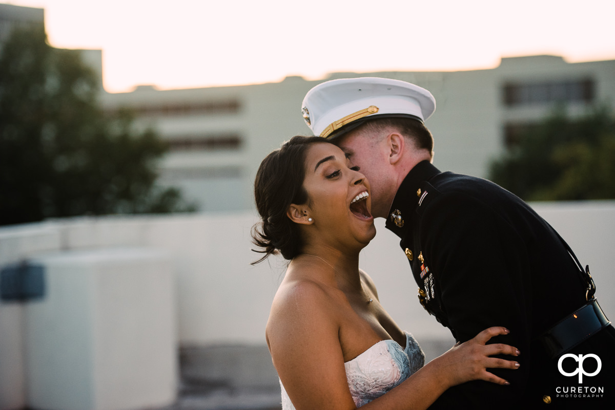 Bride smiling at her groom.