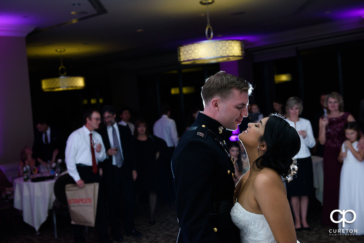 Bride and groom having a first dance at the wedding reception at the Commerce Club.