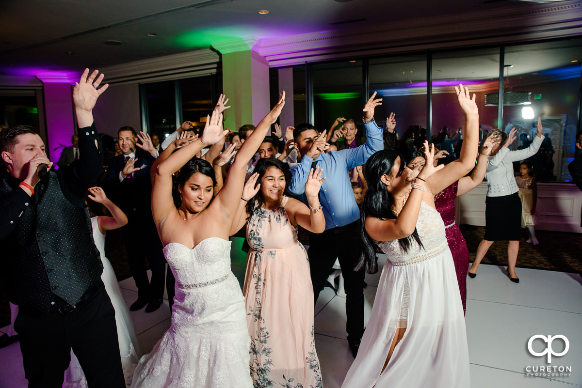Shawn with Jumping Jukebox showing the packed reception dance floor some moves.