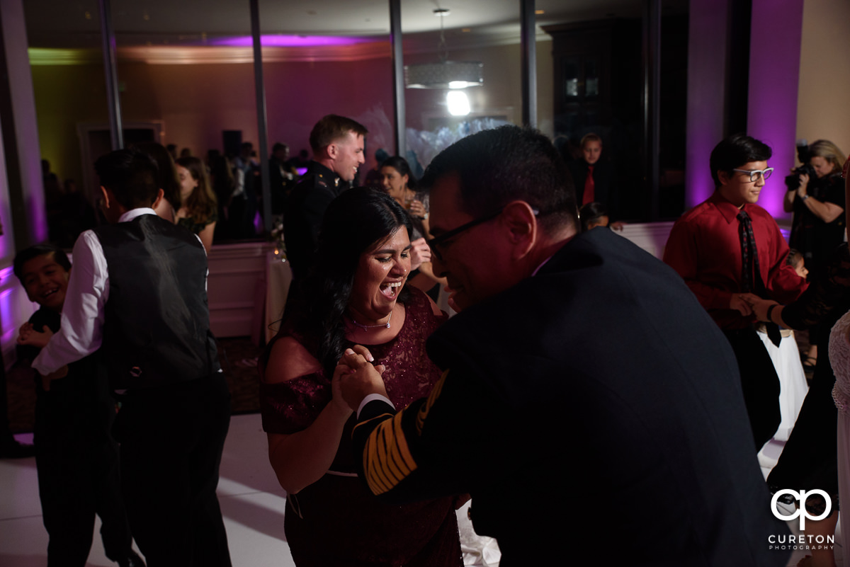 Wedding guests dancing.