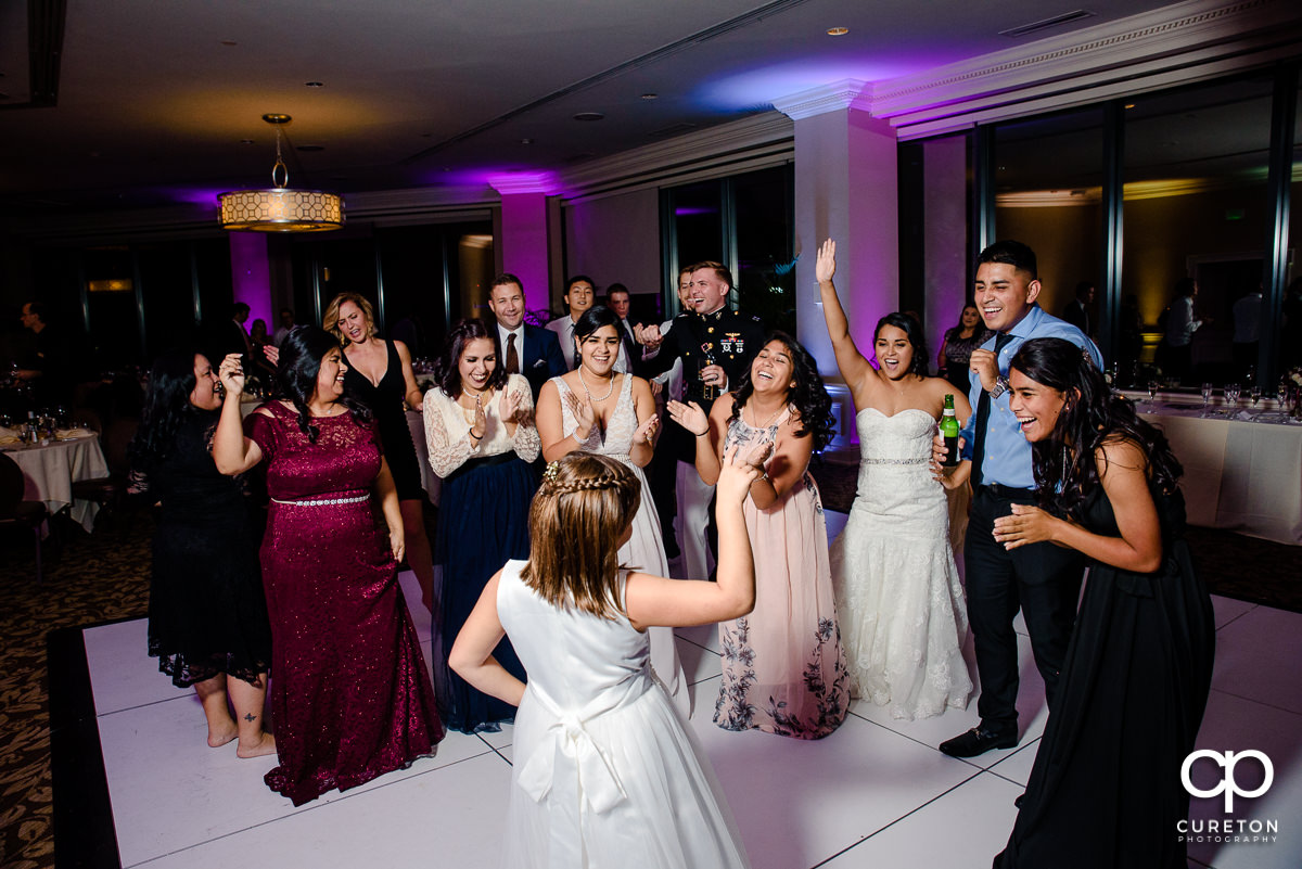 The flower girl dancing at the Commerce Club reception.