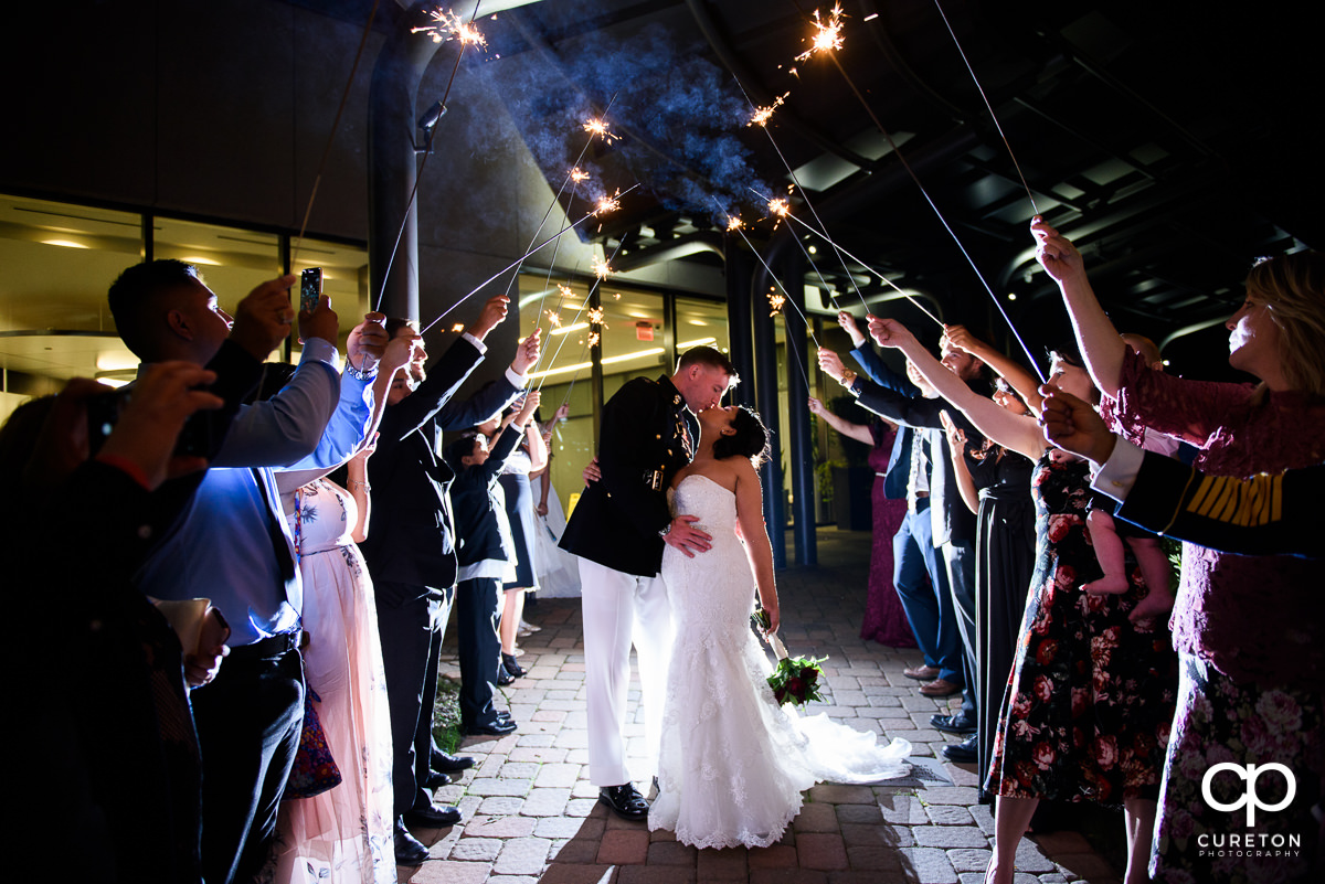 Bride and groom making a grand sparkler exit at the Commerce Club.