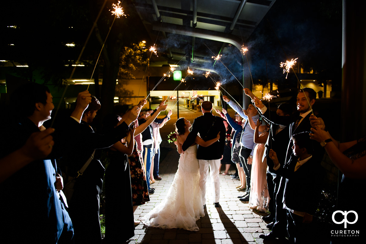 Bride and groom sparkler exit at the Commerce Club downtown.
