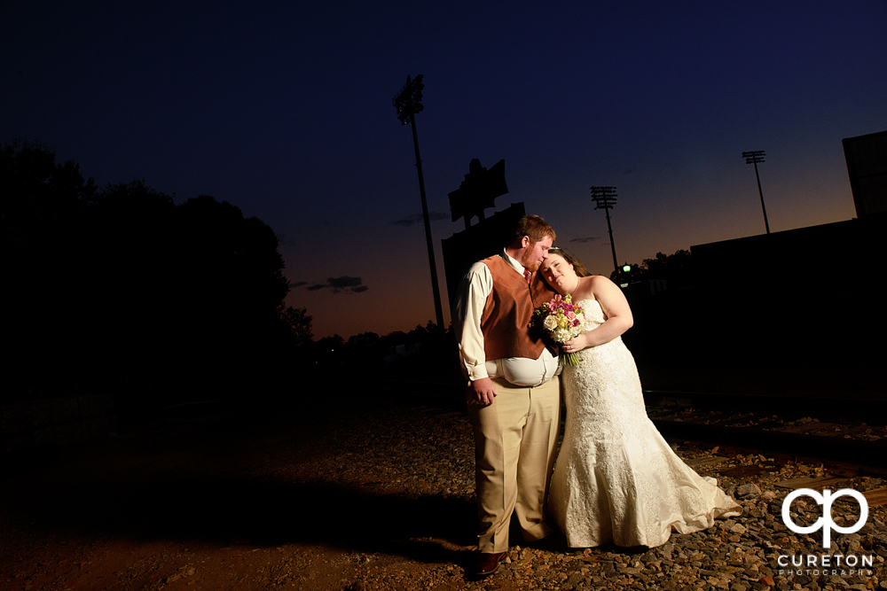 Bride and groom at sunset during their wedding reception at The Old Cigar Warehouse.