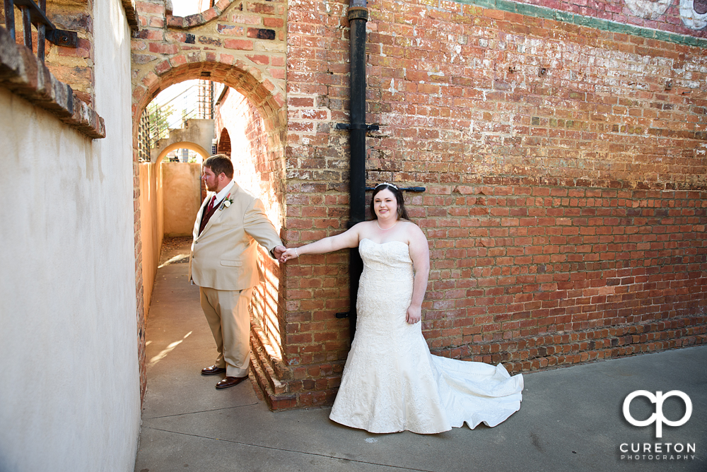 Bride and groom first touch.