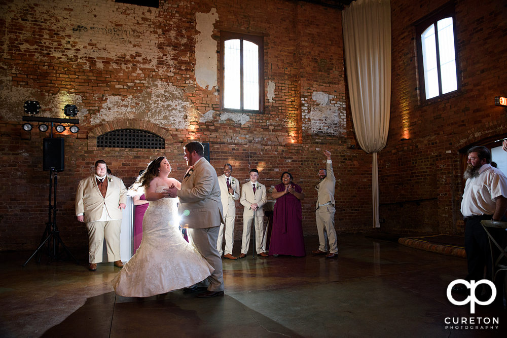 Bride and groom first dance at Old Cigar Warehouse.