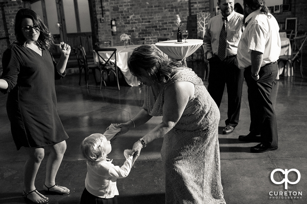 Mother of the bride dancing at the reception.