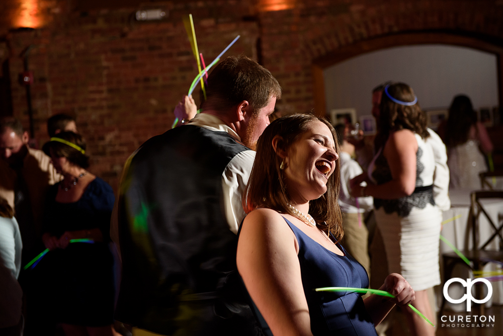 Wedding guests dancing to the sounds of Uptown Entertainment.