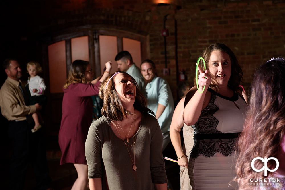 Wedding guests dancing to the sounds of Uptown Entertainment.