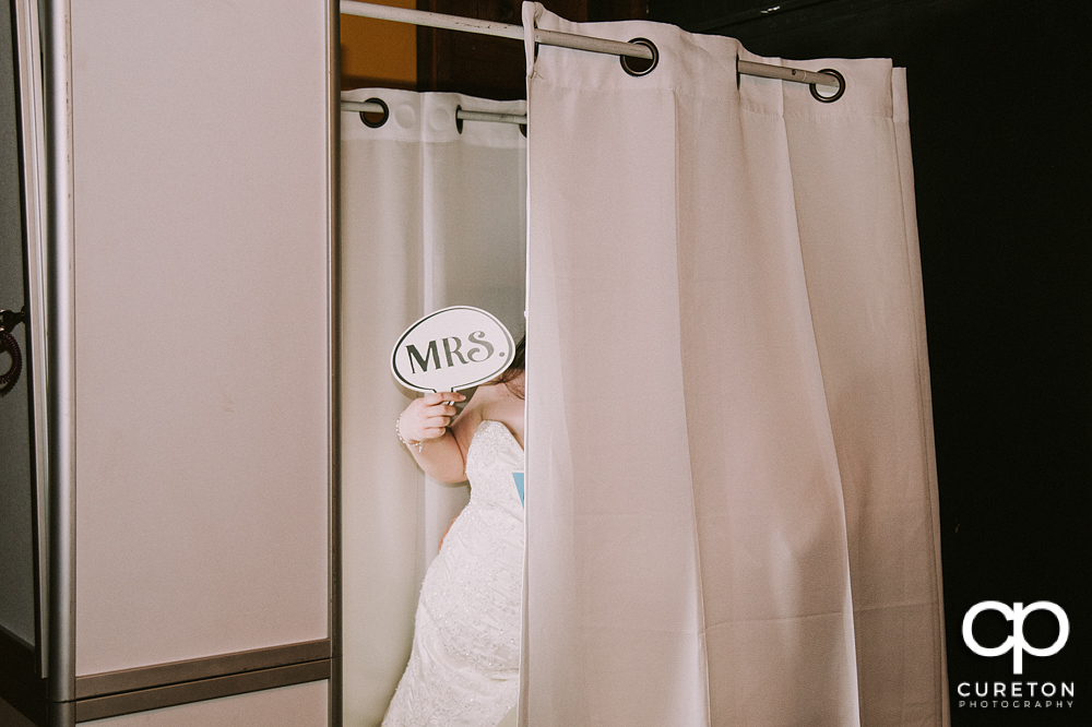 Bride in the photo booth.