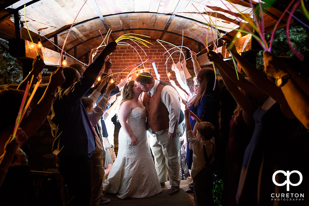 Epic glow stick wedding leave at The Old Cigar Warehouse in Greenville,SC.