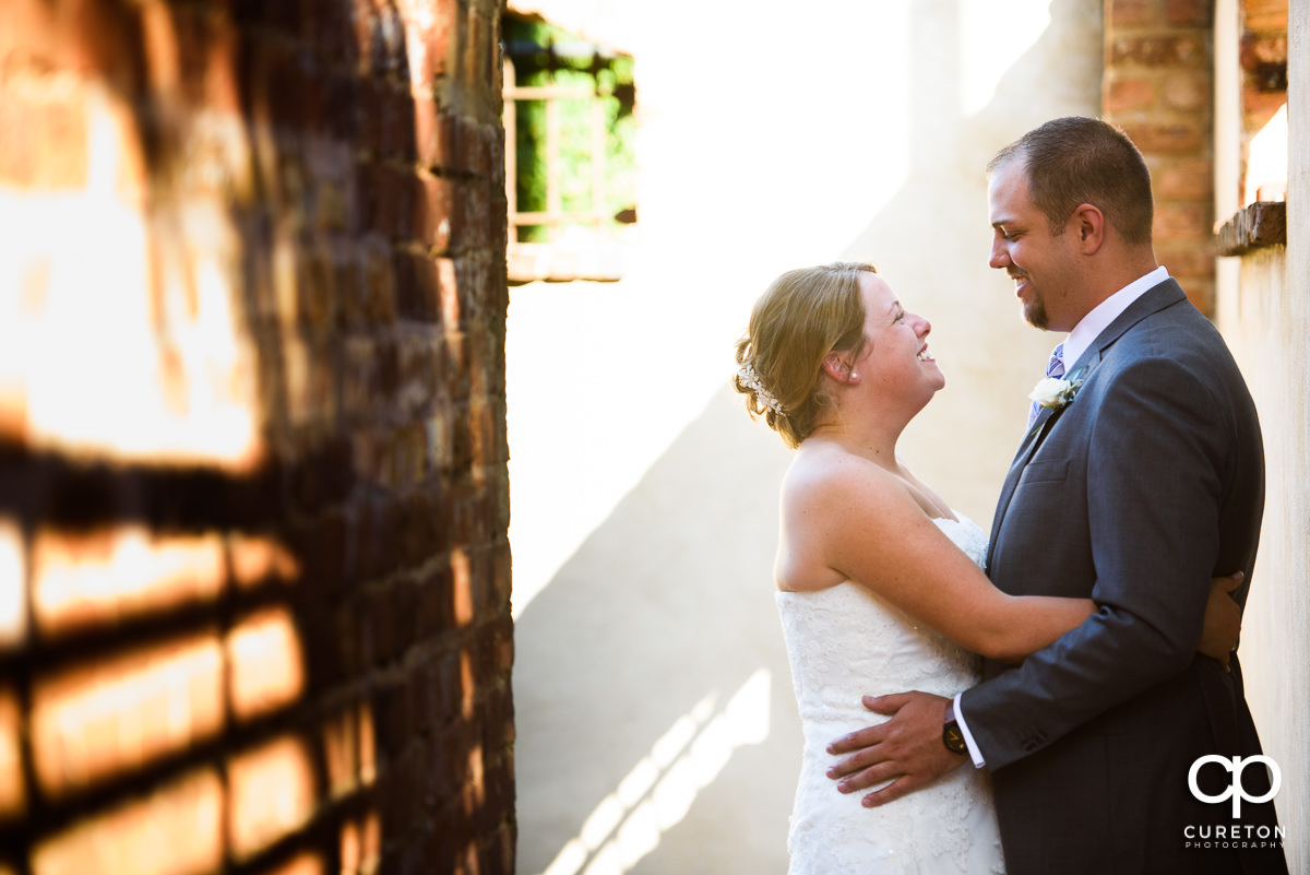Bride and groom have a first look at Old Cigar Warehouse in downtown Greenville,SC.