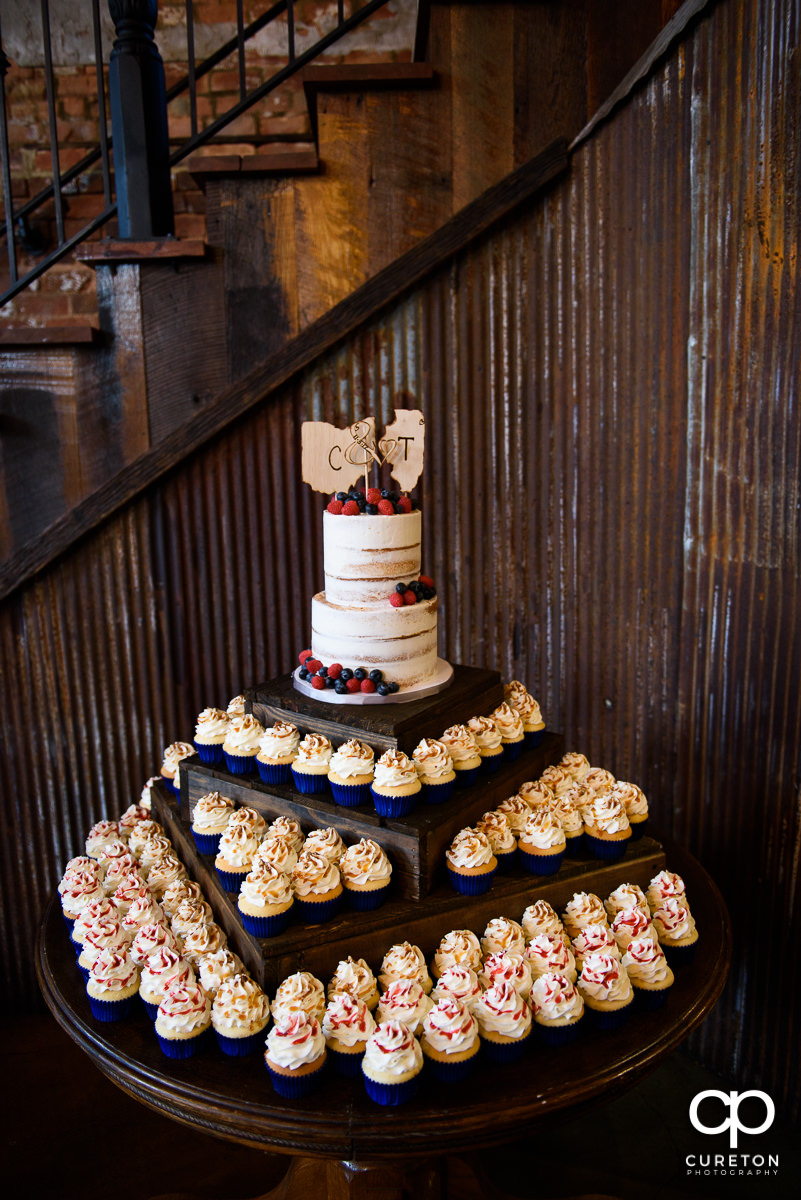 Wedding cake and Cupcakes.