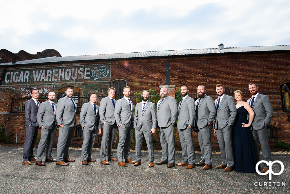 Groomsmen outside of the old cigar warehouse.
