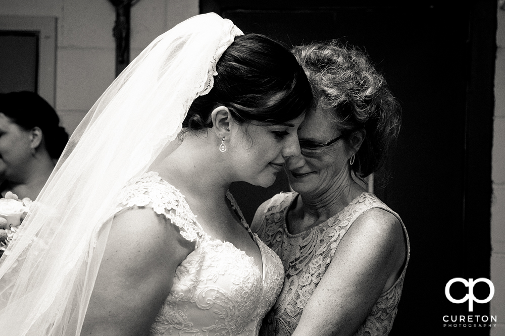 Bride and her mom at the church before the ceremony.