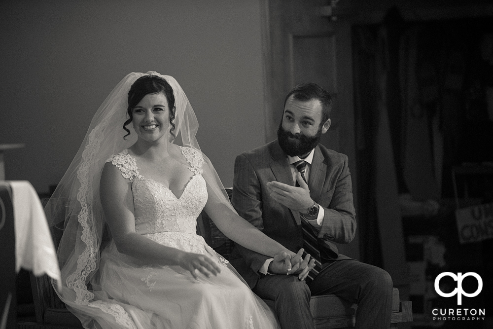Groom and bride during the ceremony.