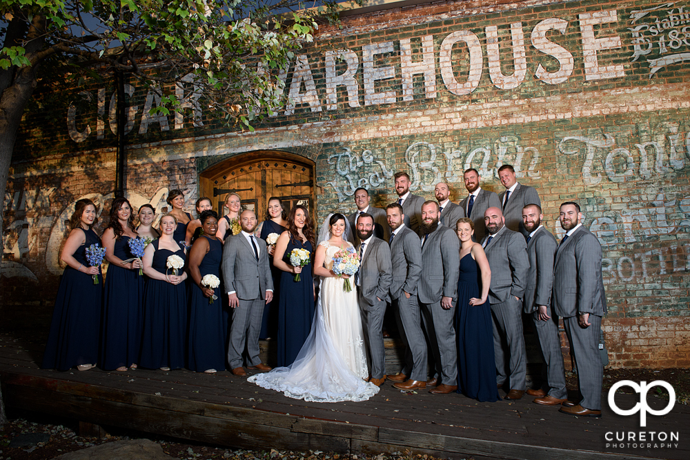 Wedding party on the back deck of the old cigar warehouse before the wedding reception.