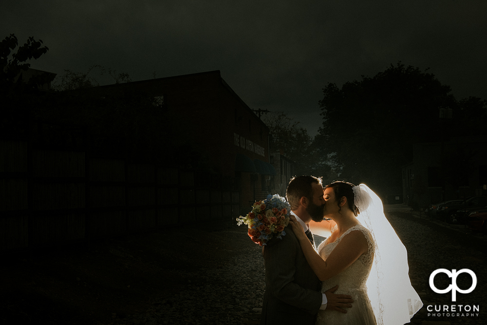Bride and groom at dusk.