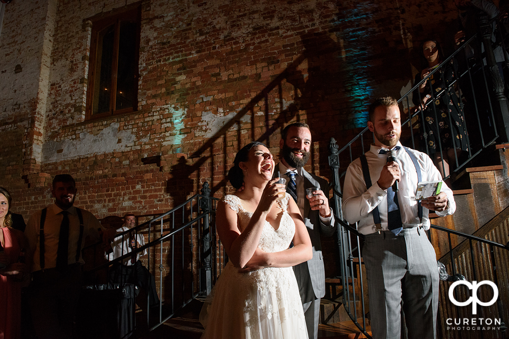 The best man giving a toast.