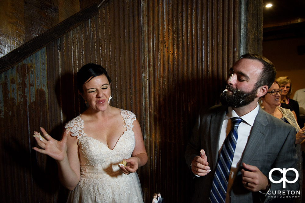 The bride and groom after the cake cutting.