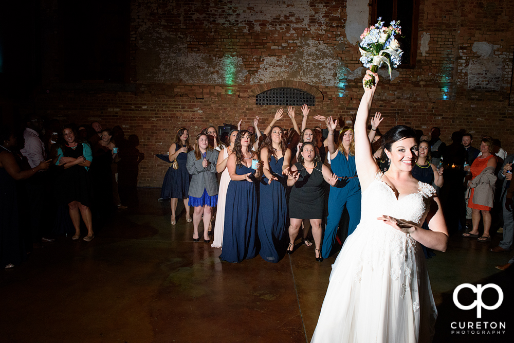 Bride tossing the bouquet.