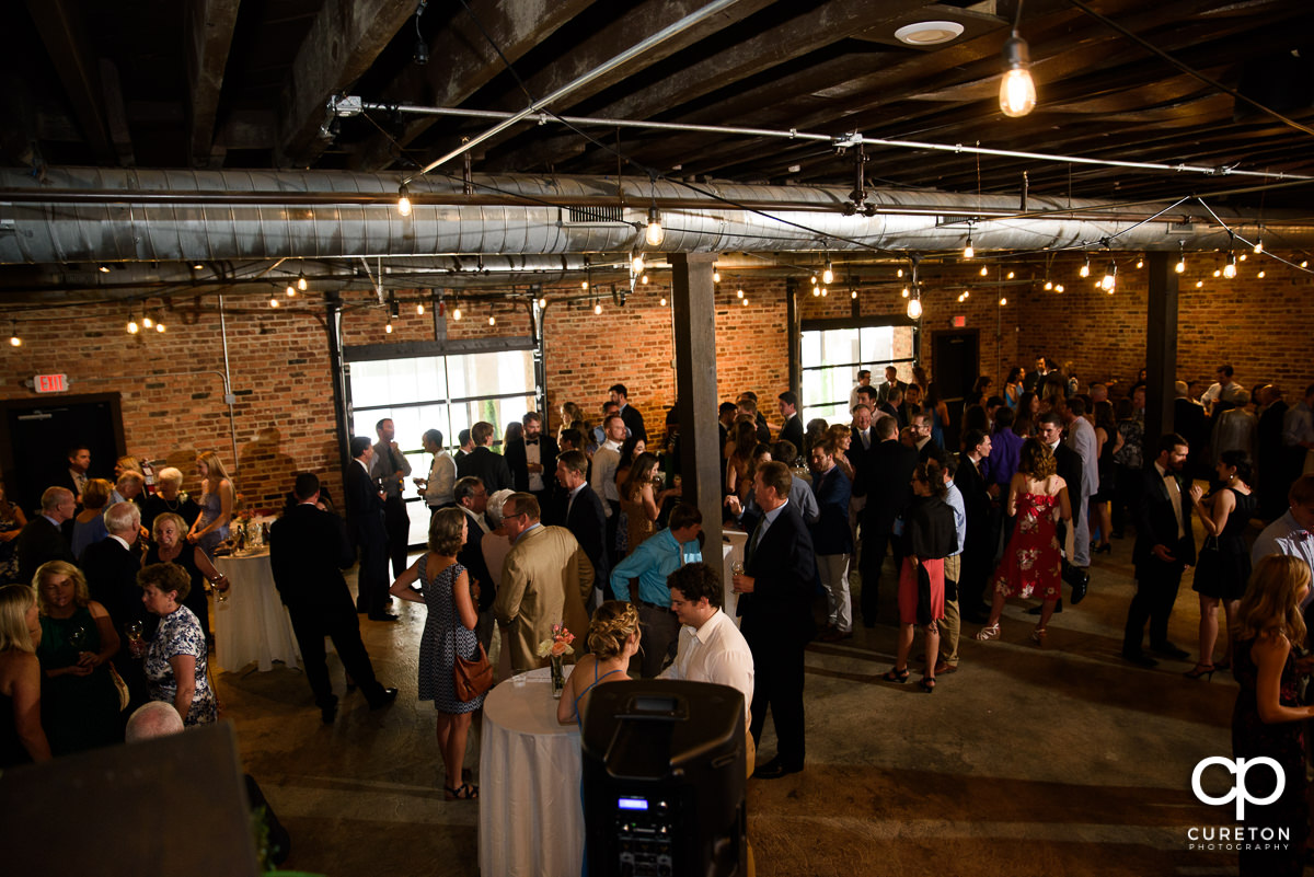 Wedding guests in the lower level of The Rutherford.
