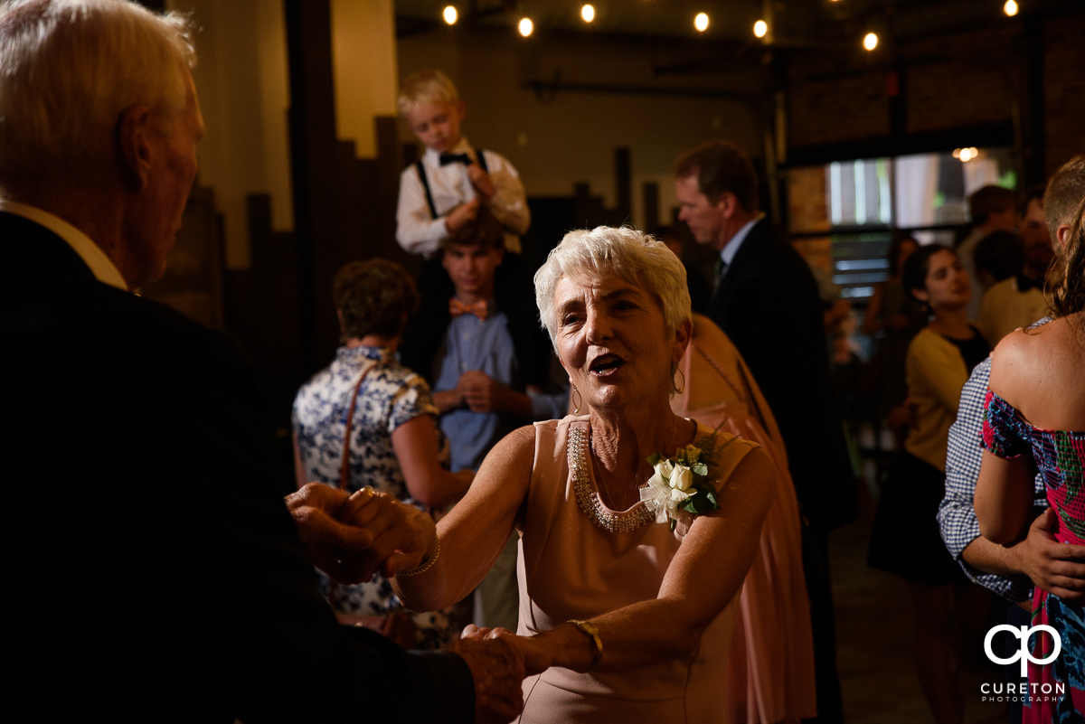 Grandma dancing at the wedding reception.
