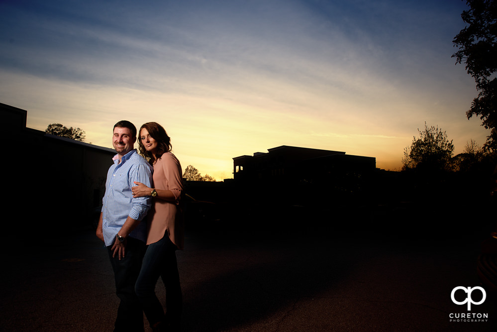 Engaged couple at sunset.