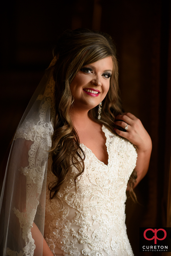 Bride looking out of the window.