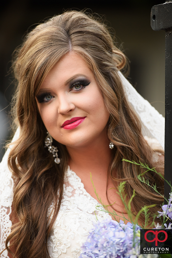 Bride with flowers downtown.