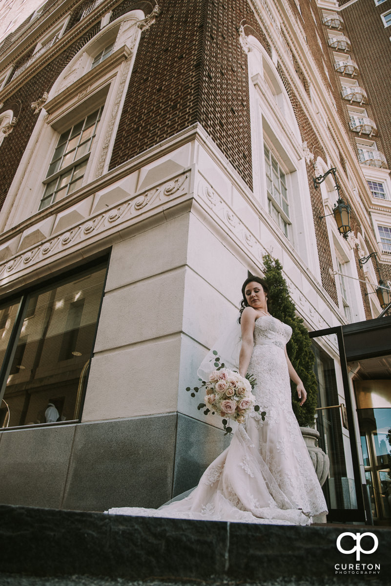 Bride in front of the Westin Poinsett before her wedding.