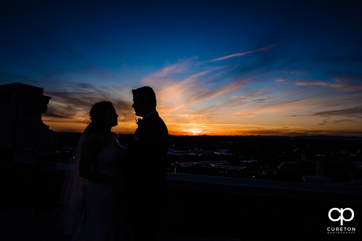 Sunset silhouette on the rooftop of the Westin Poinsett Hotel.