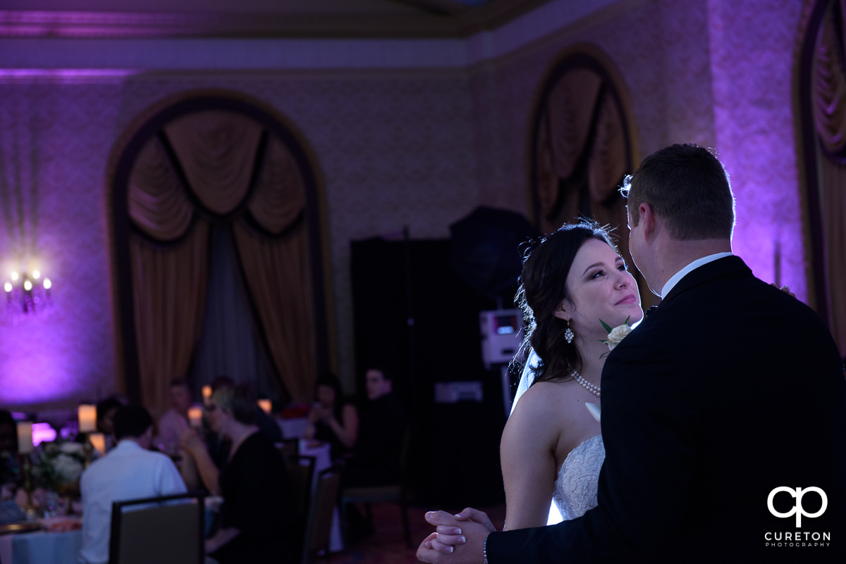 Bride smiling at her groom.