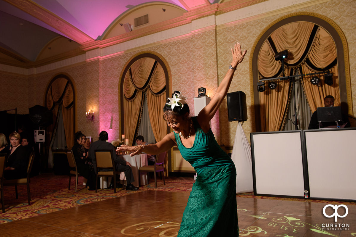 Hula dance by the bride's aunt at the reception.