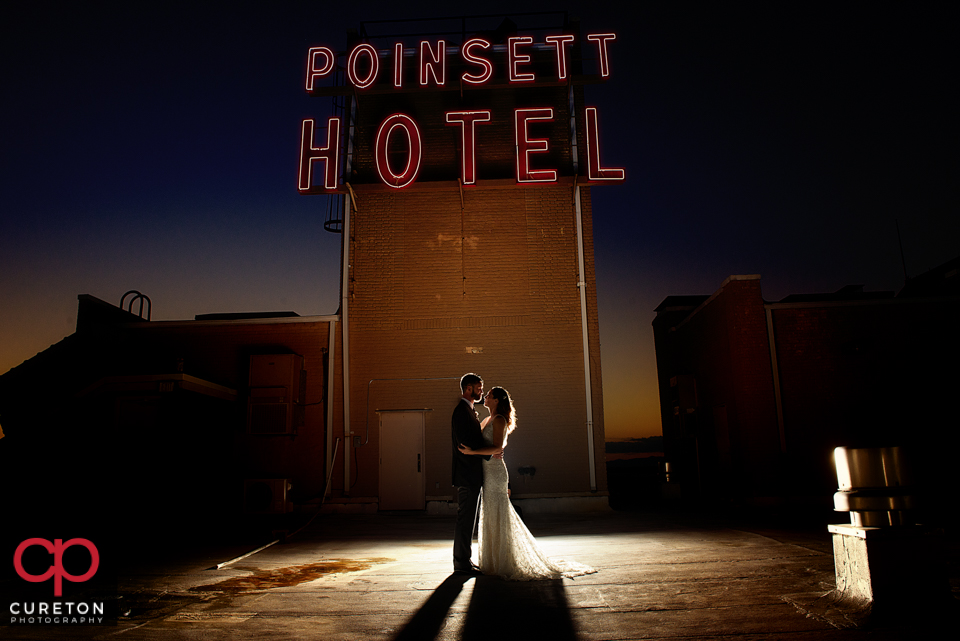 Newlyweds on the rooftop of the Westin Poinsett during their wedding reception.