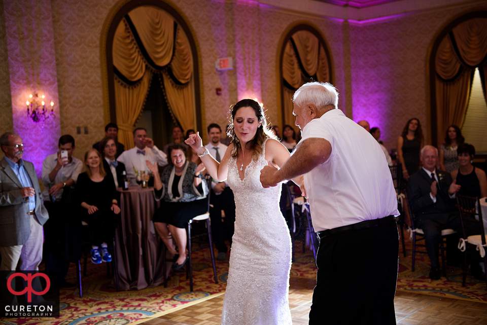 Bride and her father dancing.